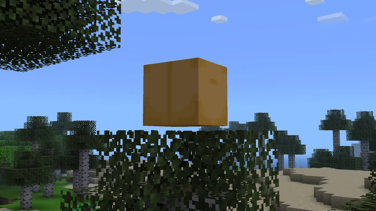 Official Verity JE box floating above Minecraft leaves